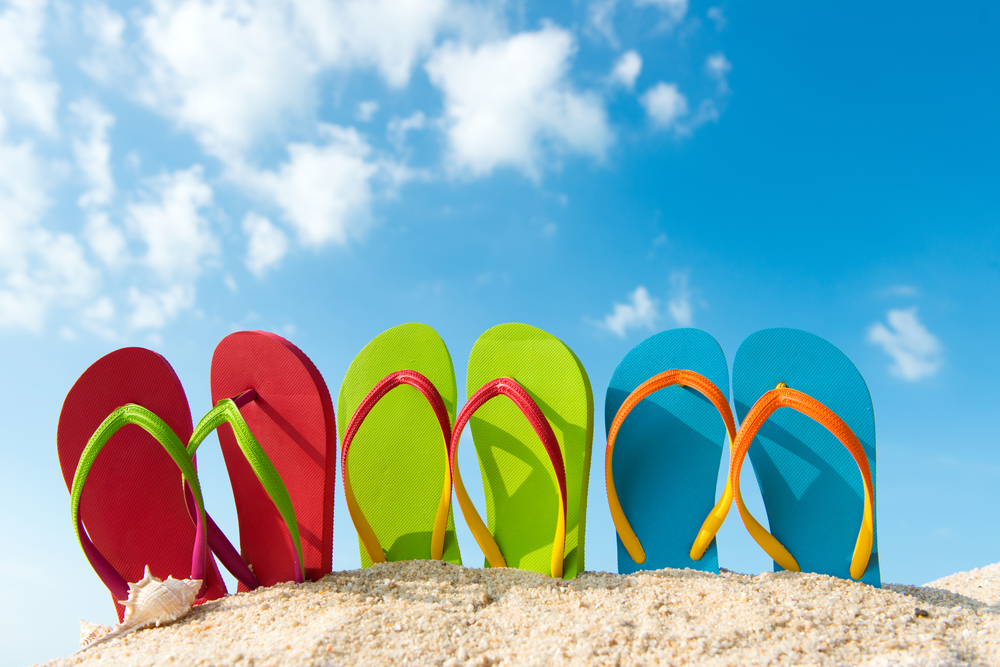 Bild von Flip Flops im Sand